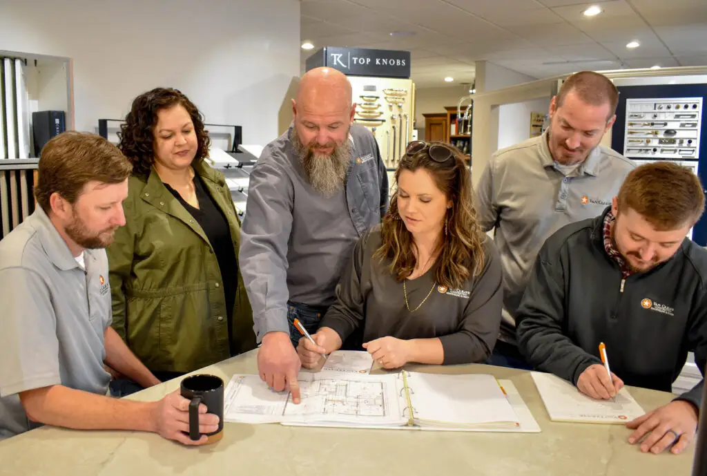 Van Cleave Construction, Remodeling, and Design employees having a team meeting